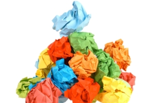 Stack of crumpled up colorful paper