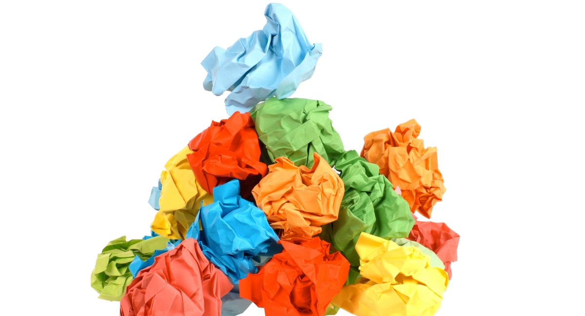 Stack of crumpled up colorful paper