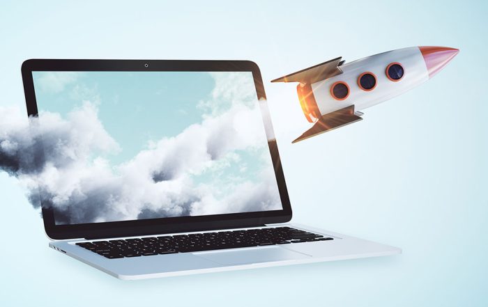 A rocket launching from a laptop; speed up your website today!