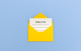 Image of physical envelope and newsletter inside How to Increase Newsletter Subscribers