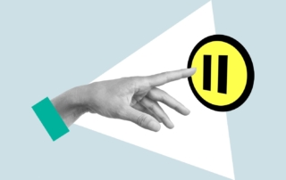 Hand pressing pause button on a rebrand idea